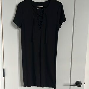 South moon under black criss cross t-shirt dress